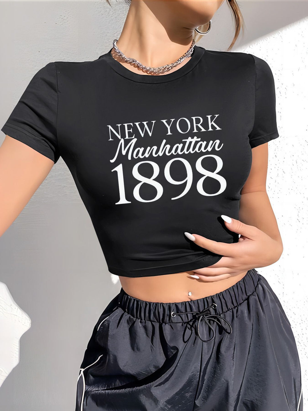 Damen Crop-T-Shirt med iögonfallande statement-tryck Mirla-Eva Jonsson