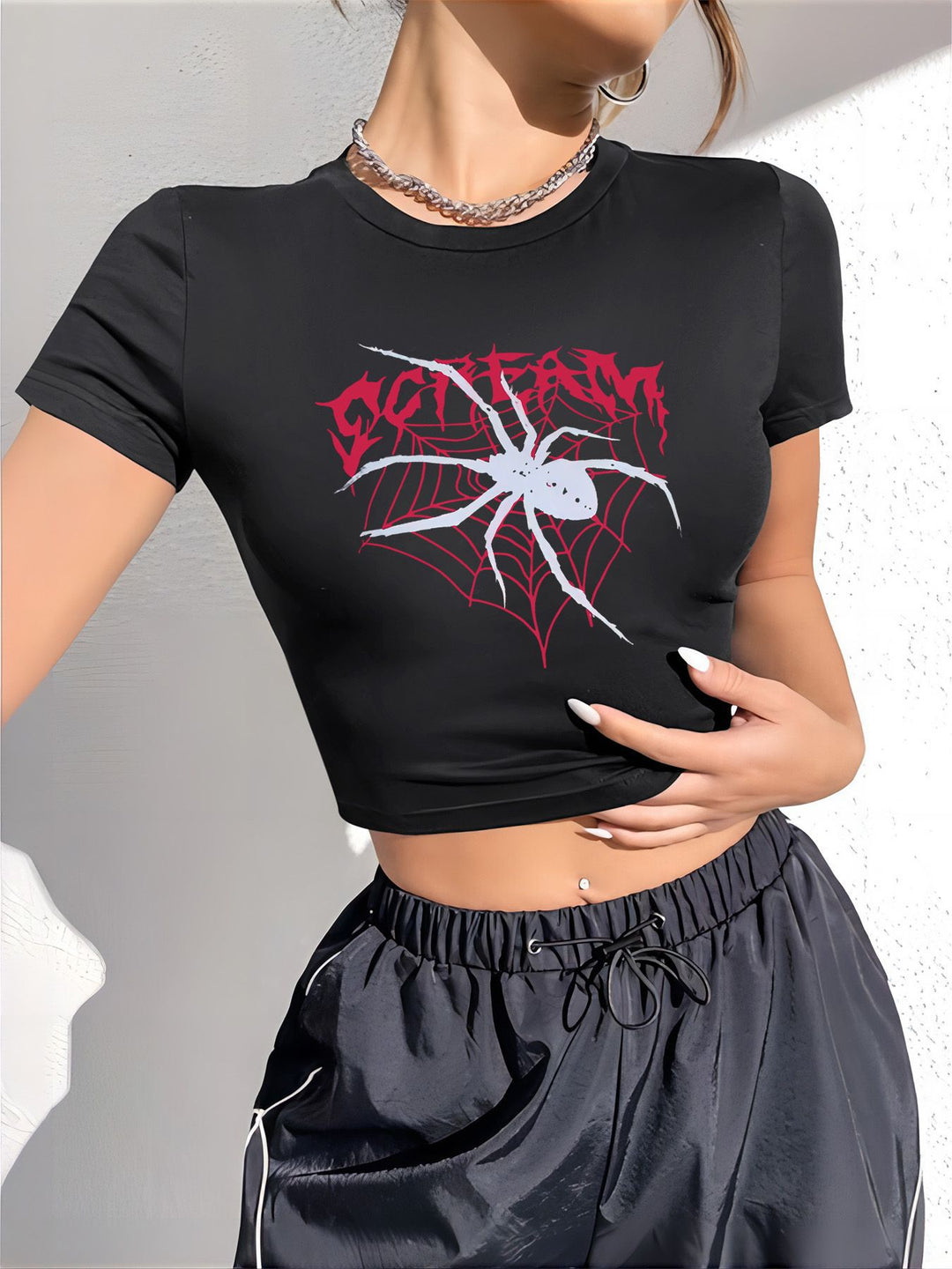 Damen Crop-T-Shirt med iögonfallande statement-tryck Mirla-Eva Jonsson