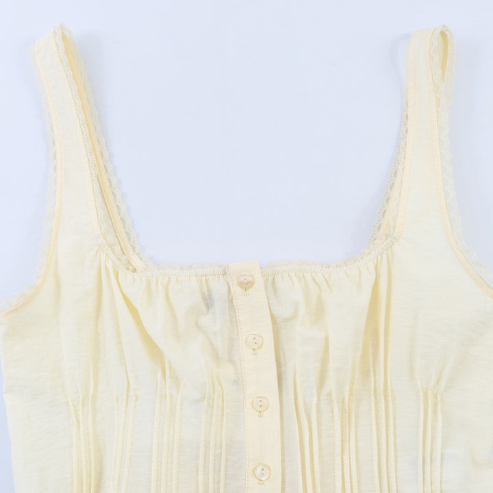 Damen-Crop-Top med fina veck och prydnadsknappar Mirla-Eva Jonsson