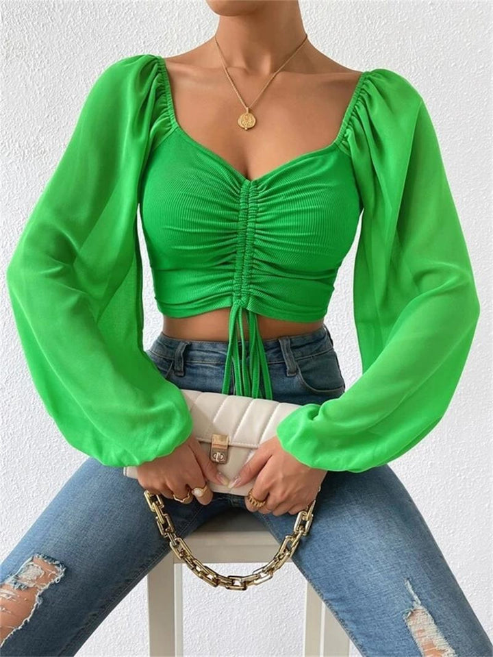 Damen Crop-Top med strukturerad kropp och eleganta puffärmar Mirla-Eva Jonsson