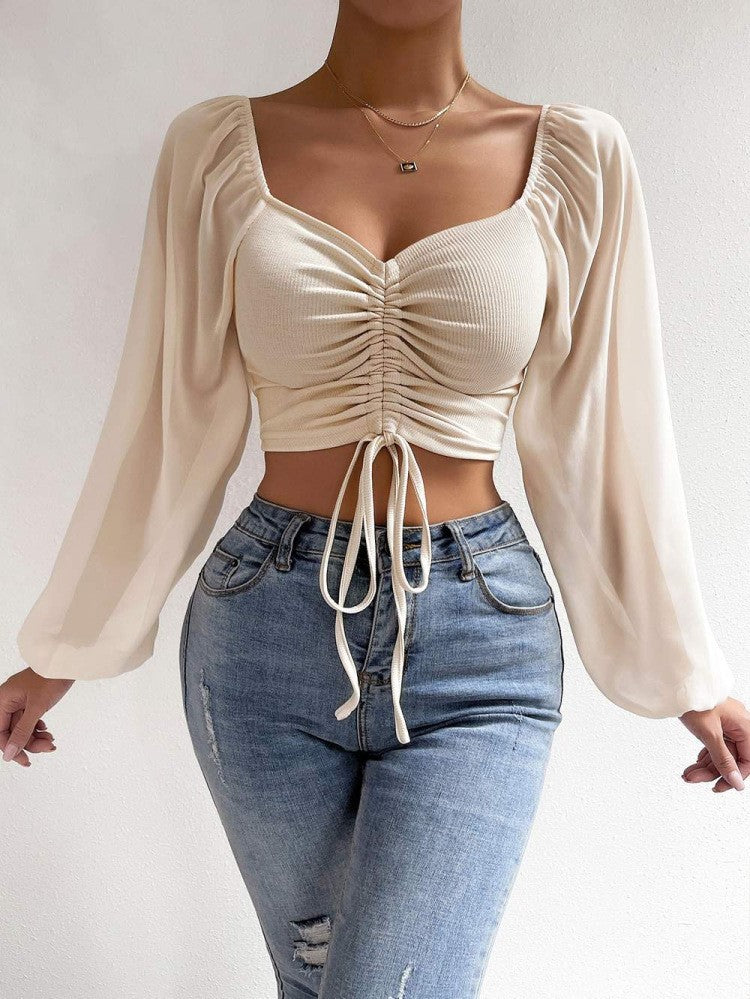 Damen Crop-Top med strukturerad kropp och eleganta puffärmar Mirla-Eva Jonsson