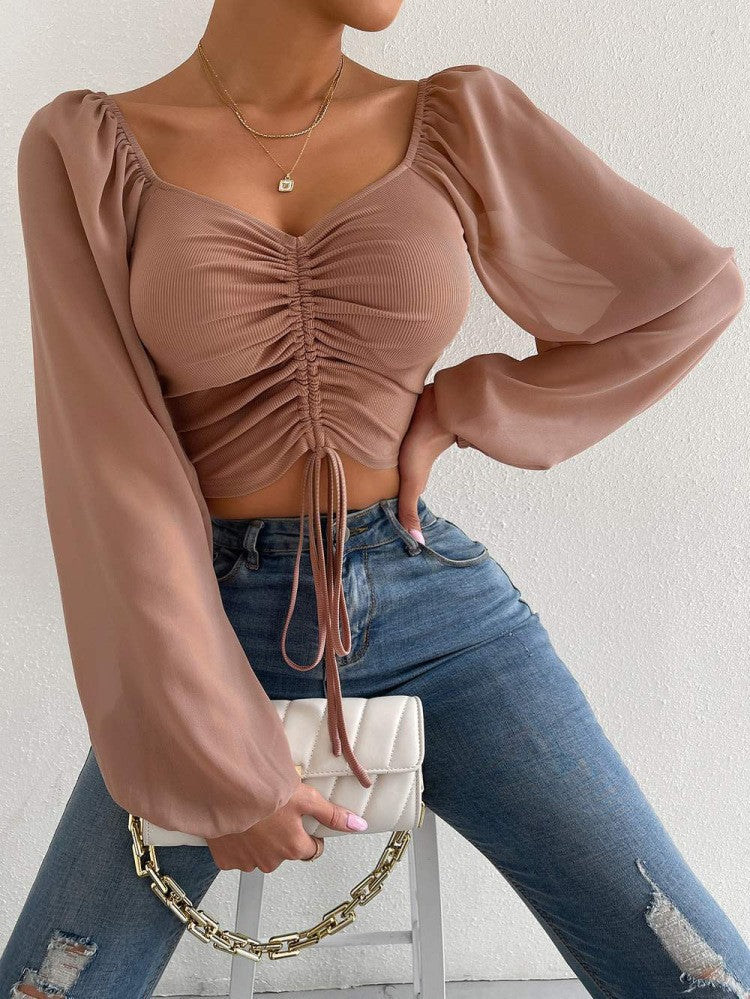 Damen Crop-Top med strukturerad kropp och eleganta puffärmar Mirla-Eva Jonsson