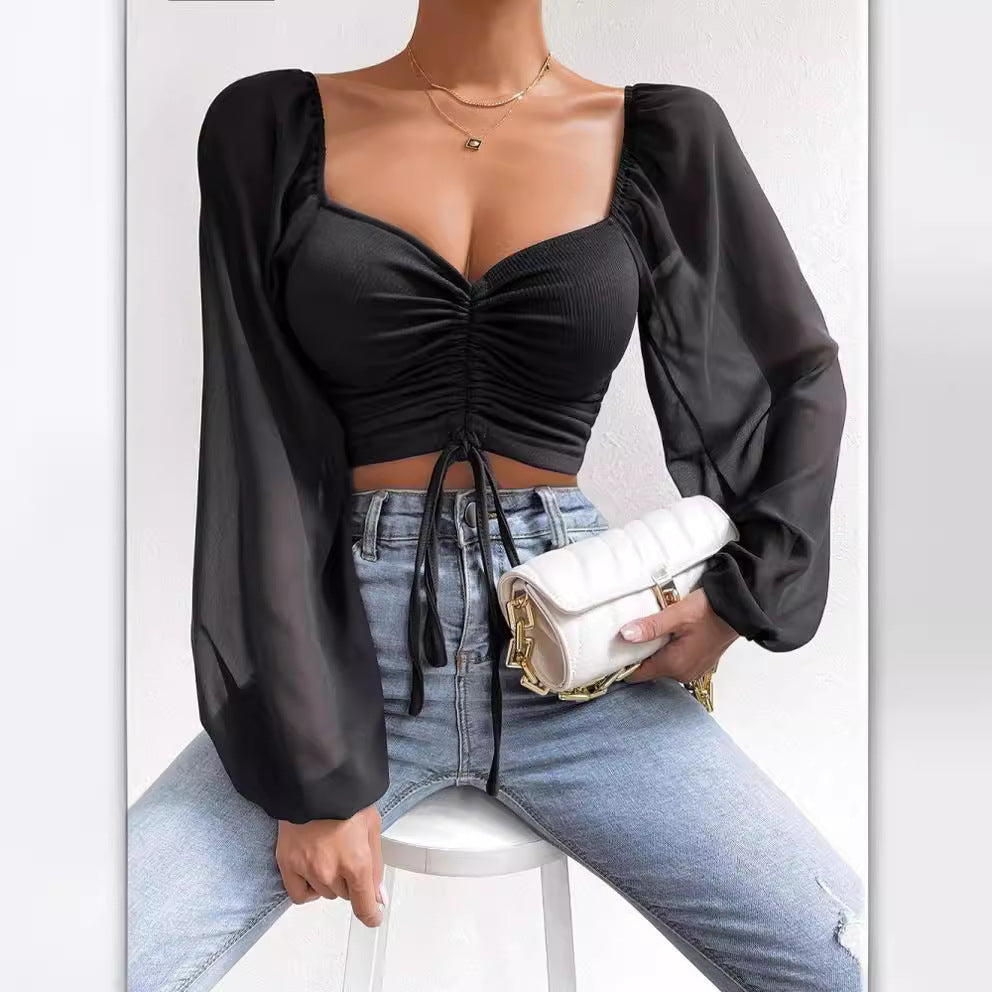 Damen Crop-Top med strukturerad kropp och eleganta puffärmar Mirla-Eva Jonsson