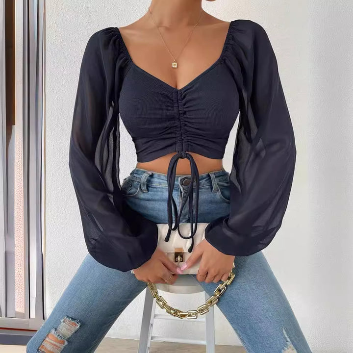 Damen Crop-Top med strukturerad kropp och eleganta puffärmar Mirla-Eva Jonsson