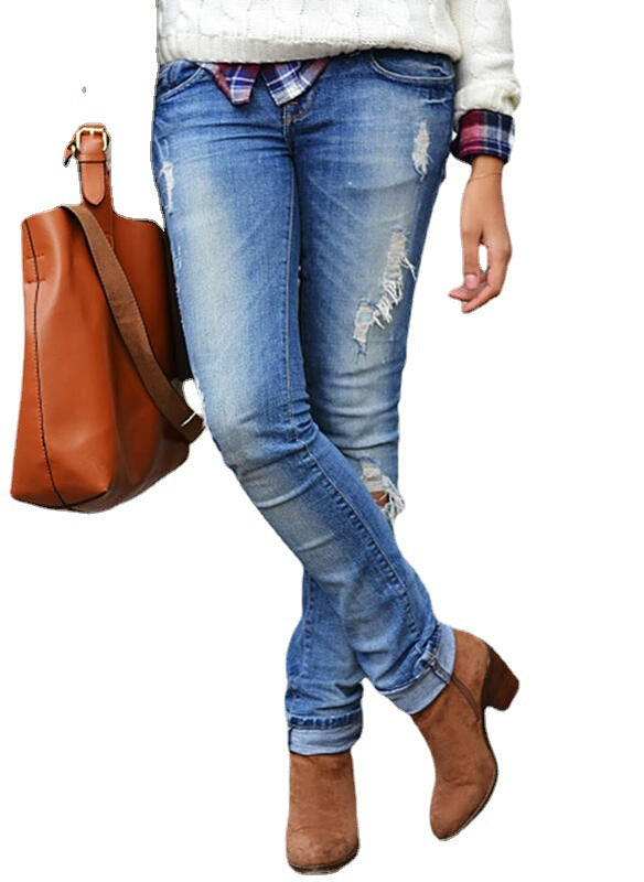 Damen Destroyed Jeans i avslappnad urban stil med modiga sprickor och figurnära passform Mirla-Eva Jonsson