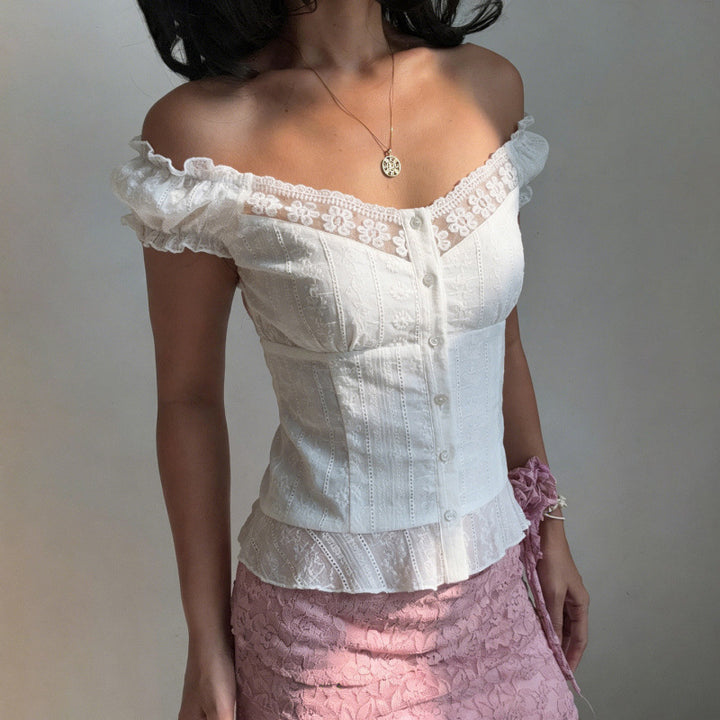 Damen Elegant blusetop med lekfulla puffärmar och knappslå Mirla-Eva Jonsson