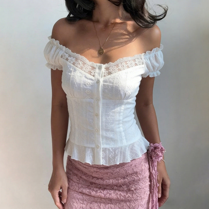 Damen Elegant blusetop med lekfulla puffärmar och knappslå Mirla-Eva Jonsson