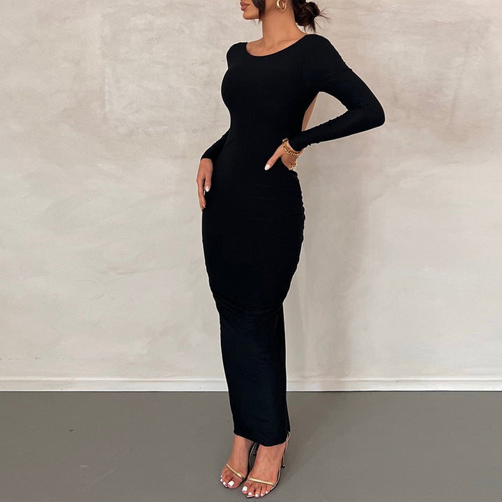 Damen Elegant figurbetonad Maxiklänning med långa ärmar och rund halsringning Mirla-Eva Jonsson