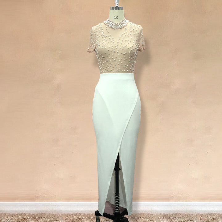 Damen Elegant klänning med transparenta puffärmar och pärldetaljer Mirla-Eva Jonsson