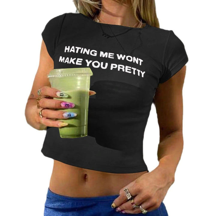 Damen Figurbetonat Crop-T-Shirt med statement text Mirla-Eva Jonsson