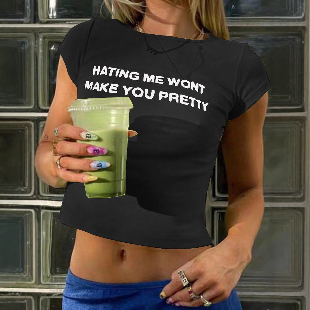 Damen Figurbetonat Crop-T-Shirt med statement text Mirla-Eva Jonsson