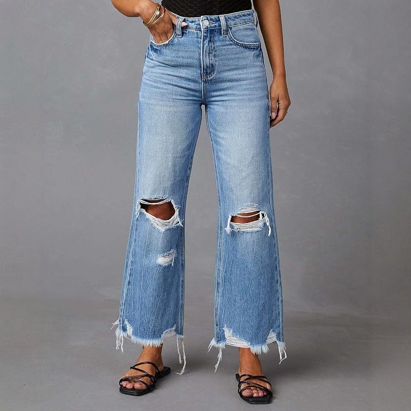 Damen Flared Jeans med stiliga slitdetaljer och fransade fållar Mirla-Eva Jonsson