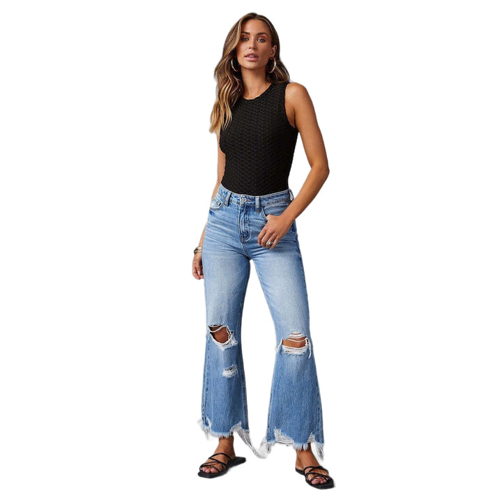 Damen Flared Jeans med stiliga slitdetaljer och fransade fållar Mirla-Eva Jonsson