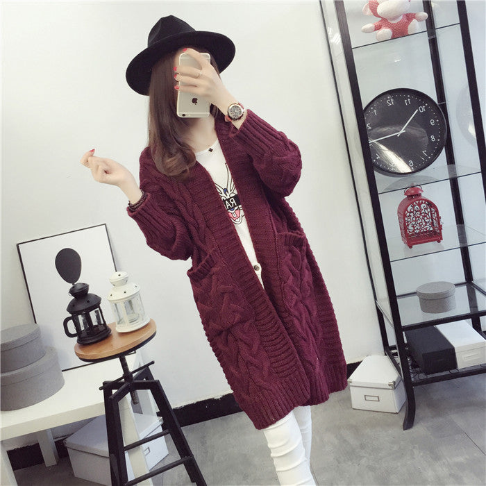 Damen Grobstrickjacke mit elegantem Zopfmuster und praktischen Taschen Mirla-Eva Jonsson
