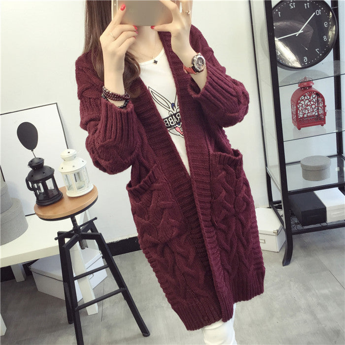 Damen Grobstrickjacke mit elegantem Zopfmuster und praktischen Taschen Mirla-Eva Jonsson
