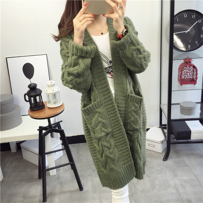 Damen Grobstrickjacke mit elegantem Zopfmuster und praktischen Taschen Mirla-Eva Jonsson