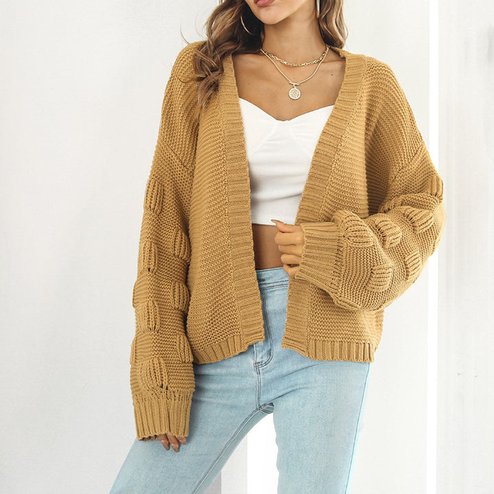 Damen Grobstrickjacke mit voluminösen Ärmeln und modernem Design Mirla-Eva Jonsson