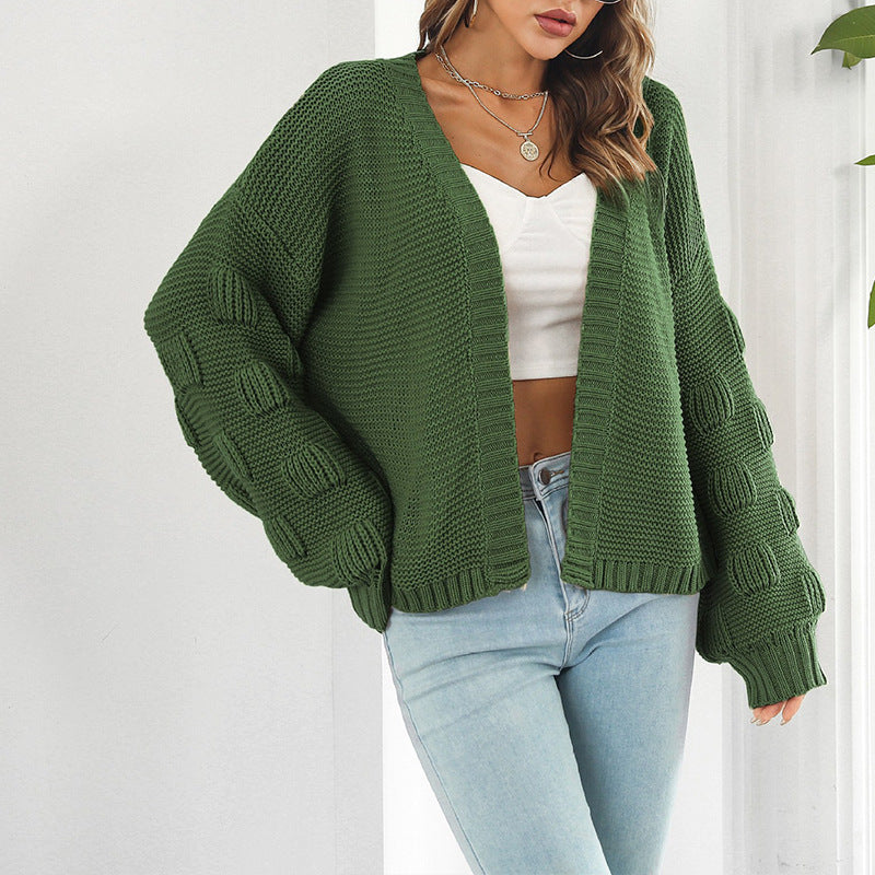 Damen Grobstrickjacke mit voluminösen Ärmeln und modernem Design Mirla-Eva Jonsson