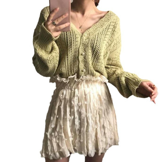 Damen Grobstrickpullover mit modischem V-Ausschnitt und Knopfdetails Mirla-Eva Jonsson