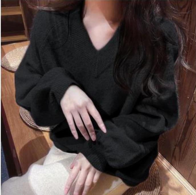 Damen Grobstrickpullover mit tiefem V-Ausschnitt und voluminösen Ärmeln Mirla-Eva Jonsson