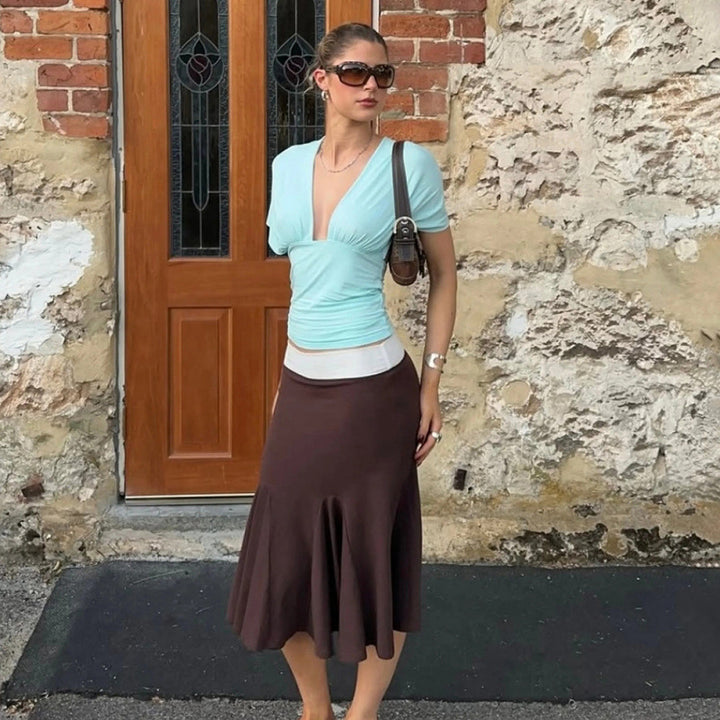 Damen Haltertop med elegant invecklad design och figurnära passform Mirla-Eva Jonsson