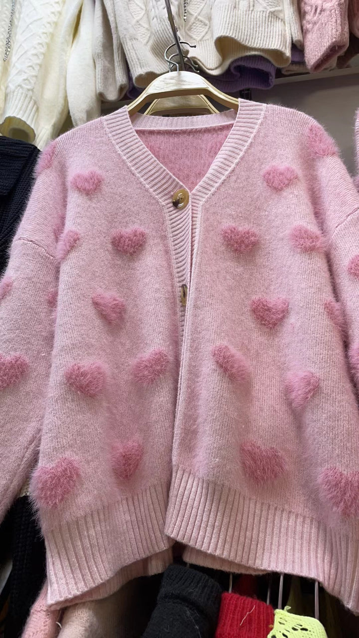Damen Kuschelige Strickjacke mit herzförmigem Design und Knopfdetail Eva Jonsson-Eva Jonsson
