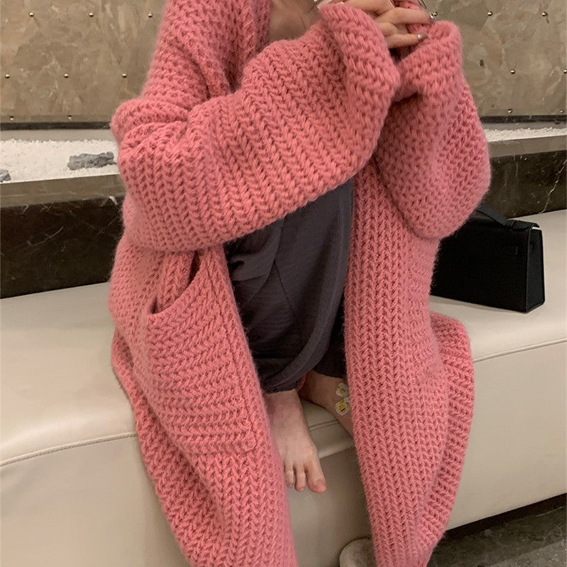 Damen Lange Strickjacke mit praktischen Taschen und modischem Zopfmuster Mirla-Eva Jonsson