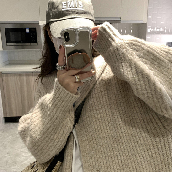 Damen Langstrickjacke mit eleganter Rippstruktur und praktischen Taschen Mirla-Eva Jonsson