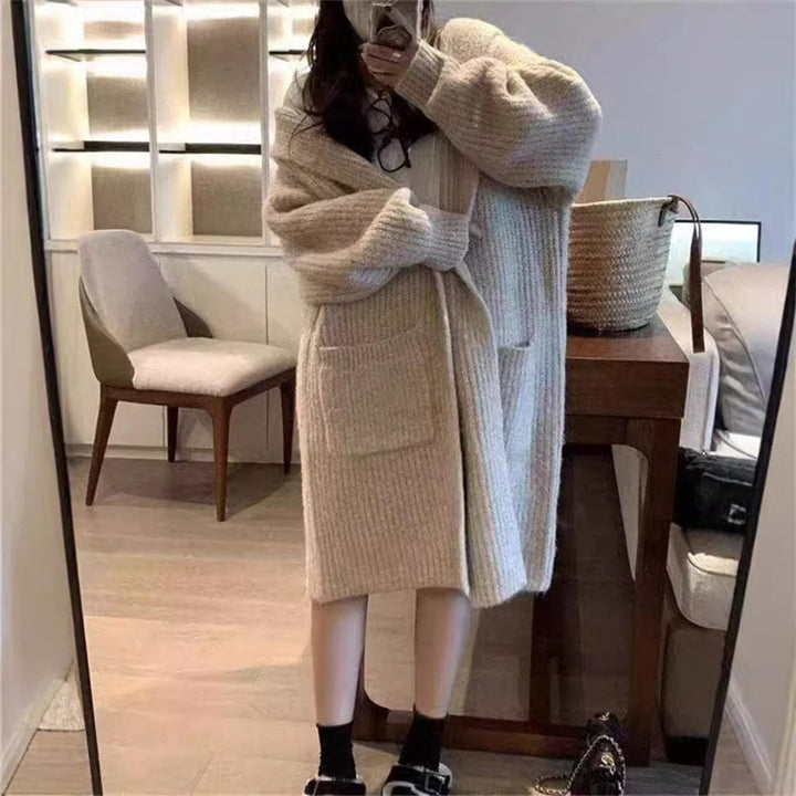 Damen Langstrickjacke mit eleganter Rippstruktur und praktischen Taschen Mirla-Eva Jonsson