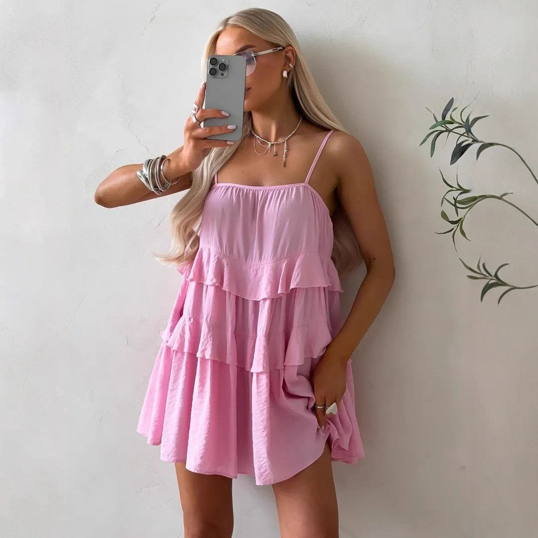 Damen Lekfull puffklänning i lätt bomullsmaterial med ruffle-detaljer Mirla-Eva Jonsson