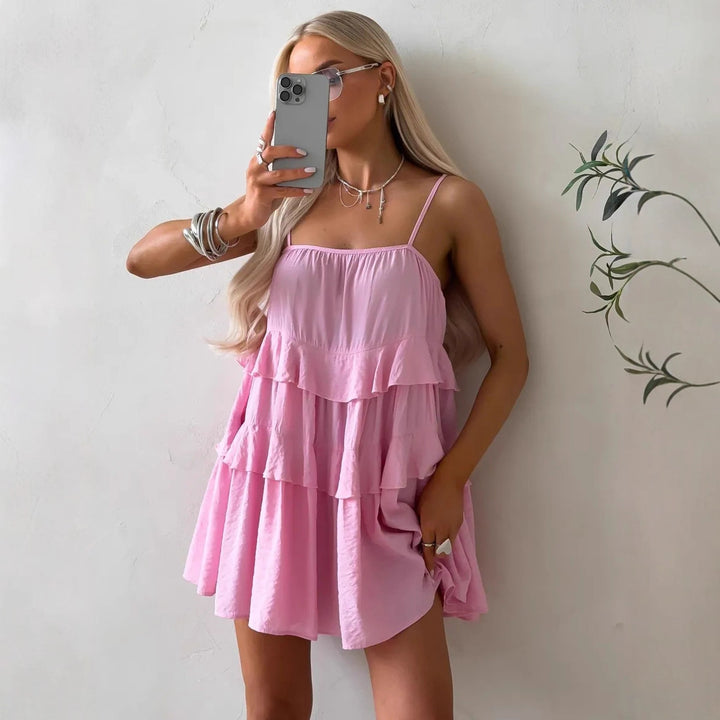 Damen Lekfull puffklänning i lätt bomullsmaterial med ruffle-detaljer Mirla-Eva Jonsson