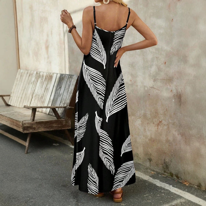 Damen Maxiklänning med elegant bladdesign och fina spaghetti band Mirla-Eva Jonsson