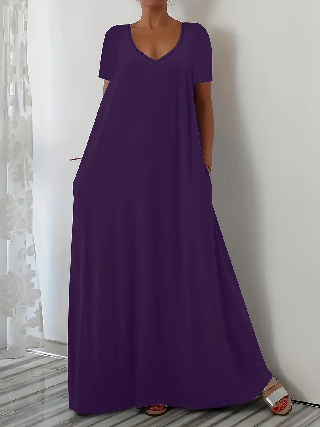 Damen Maxikleid mit tiefem V-Ausschnitt und praktischen Seitentaschen Mirla-Eva Jonsson
