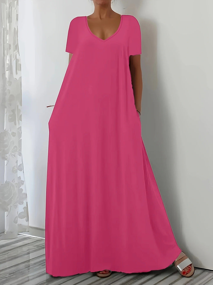 Damen Maxikleid mit tiefem V-Ausschnitt und praktischen Seitentaschen Mirla-Eva Jonsson