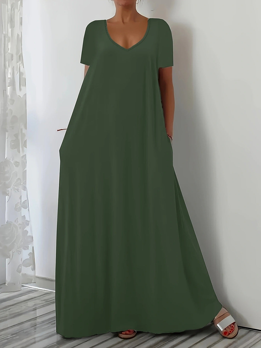 Damen Maxikleid mit tiefem V-Ausschnitt und praktischen Seitentaschen Mirla-Eva Jonsson