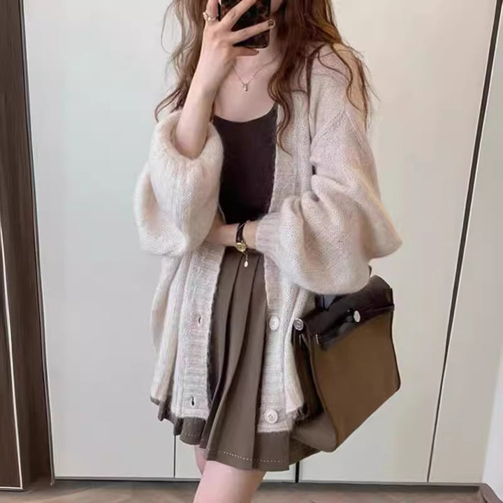 Damen Modische Strickjacke mit weiten Ärmeln und eleganten Details Mirla-Eva Jonsson