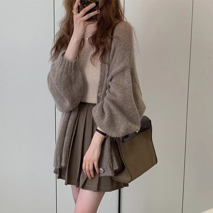 Damen Modische Strickjacke mit weiten Ärmeln und eleganten Details Mirla-Eva Jonsson