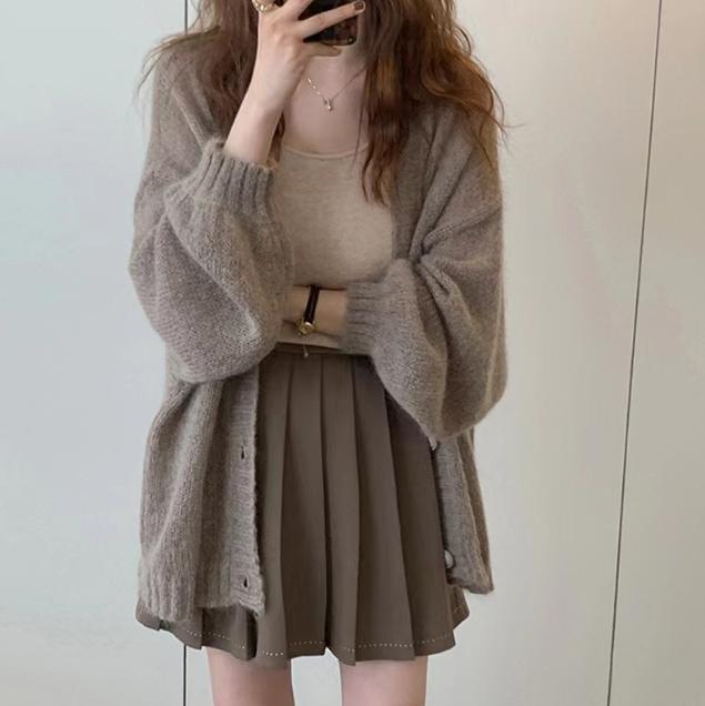 Damen Modische Strickjacke mit weiten Ärmeln und eleganten Details Mirla-Eva Jonsson