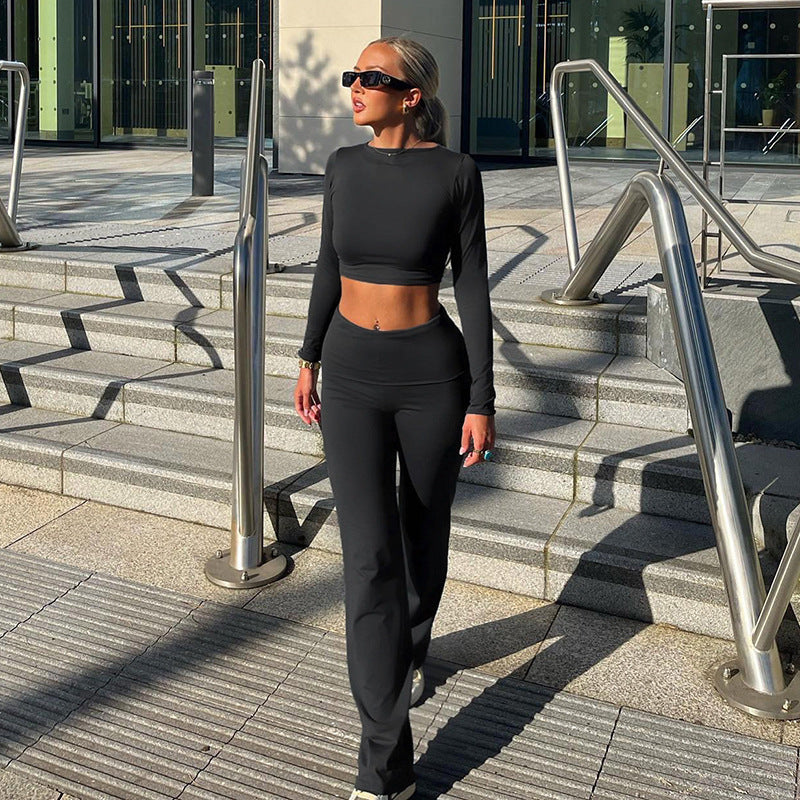 Damen Sportliches Långärmad Crop Top och figurnära Flared Byxor Set Mirla-Eva Jonsson