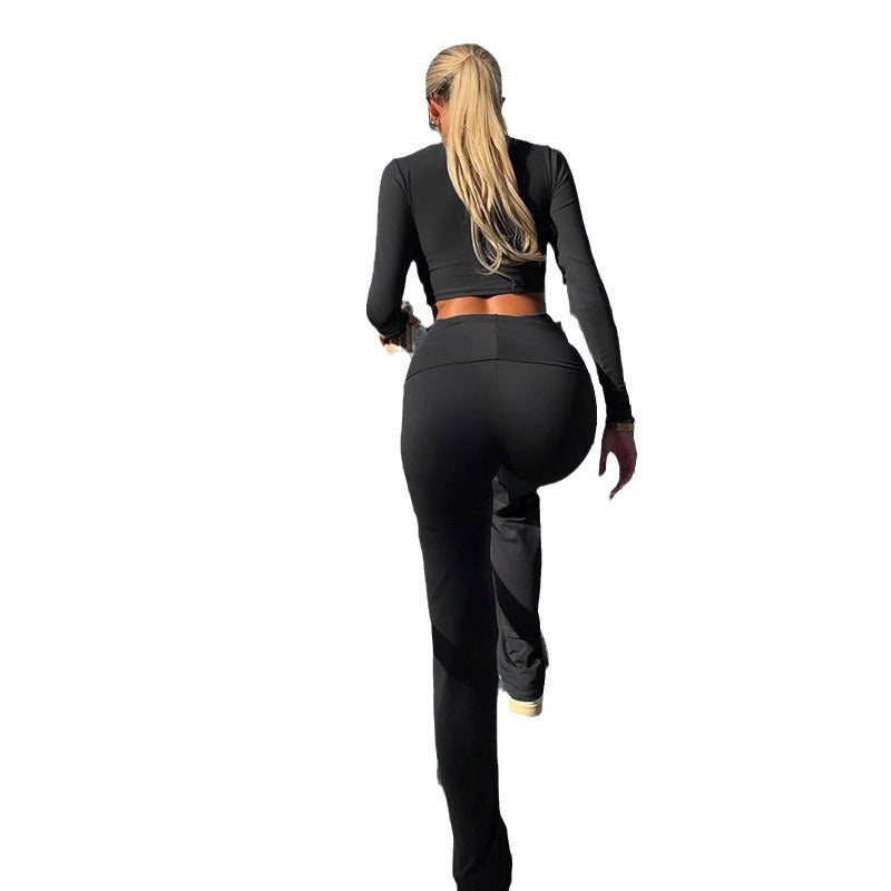 Damen Sportliches Långärmad Crop Top och figurnära Flared Byxor Set Mirla-Eva Jonsson