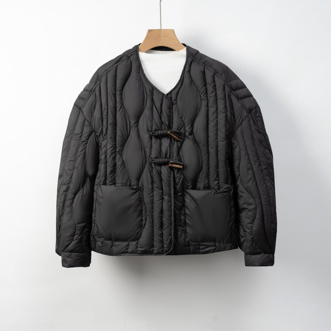 Damen Steppjacke mit praktischem Knopfverschluss und gemütlichen Taschen Mirla-Eva Jonsson
