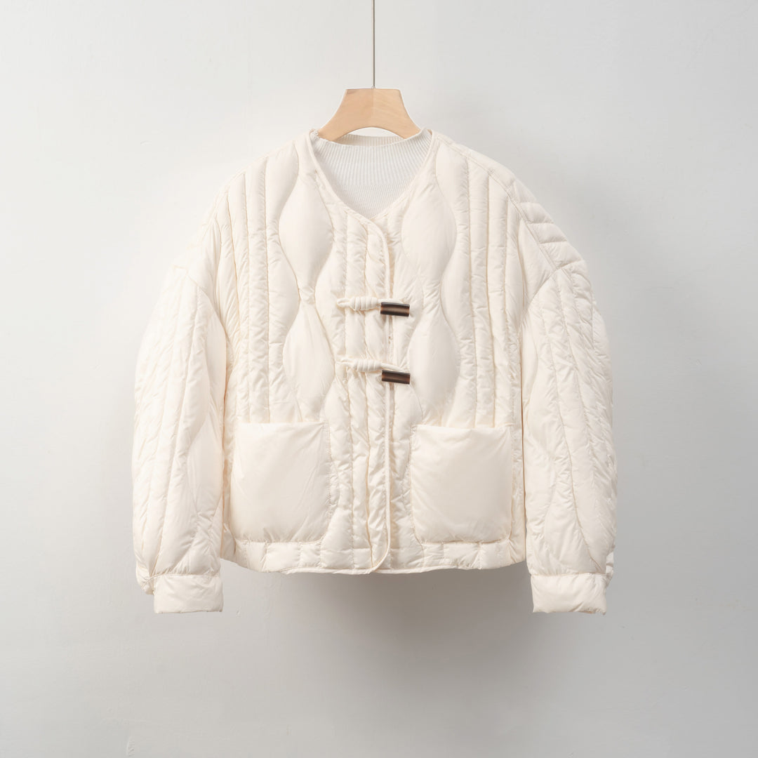 Damen Steppjacke mit praktischem Knopfverschluss und gemütlichen Taschen Mirla-Eva Jonsson