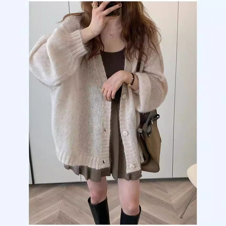 Damen Strickjacke im lässigen Oversized-Stil mit voluminösen Ärmeln und praktischen Taschen Mirla-Eva Jonsson