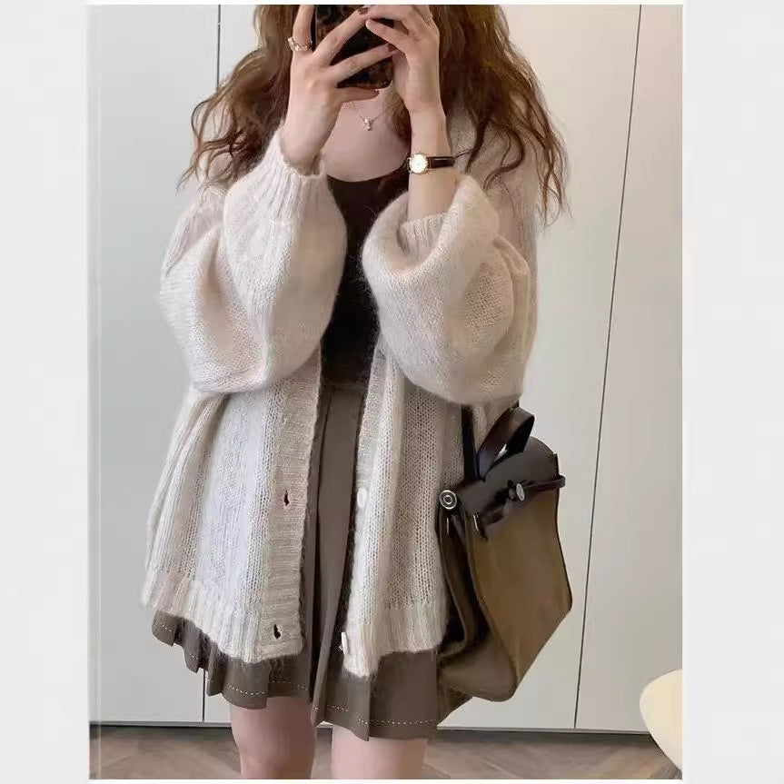 Damen Strickjacke im lässigen Oversized-Stil mit voluminösen Ärmeln und praktischen Taschen Mirla-Eva Jonsson