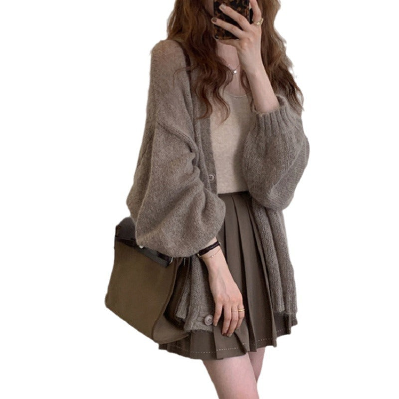 Damen Strickjacke im lässigen Oversized-Stil mit voluminösen Ärmeln und praktischen Taschen Mirla-Eva Jonsson