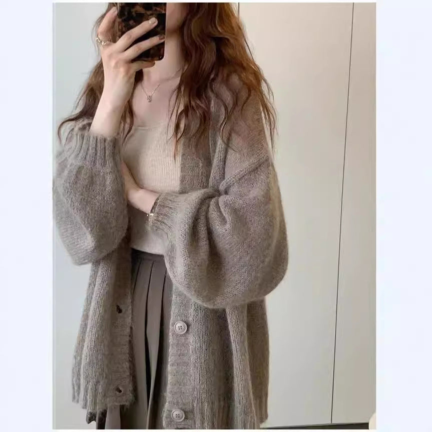 Damen Strickjacke im lässigen Oversized-Stil mit voluminösen Ärmeln und praktischen Taschen Mirla-Eva Jonsson