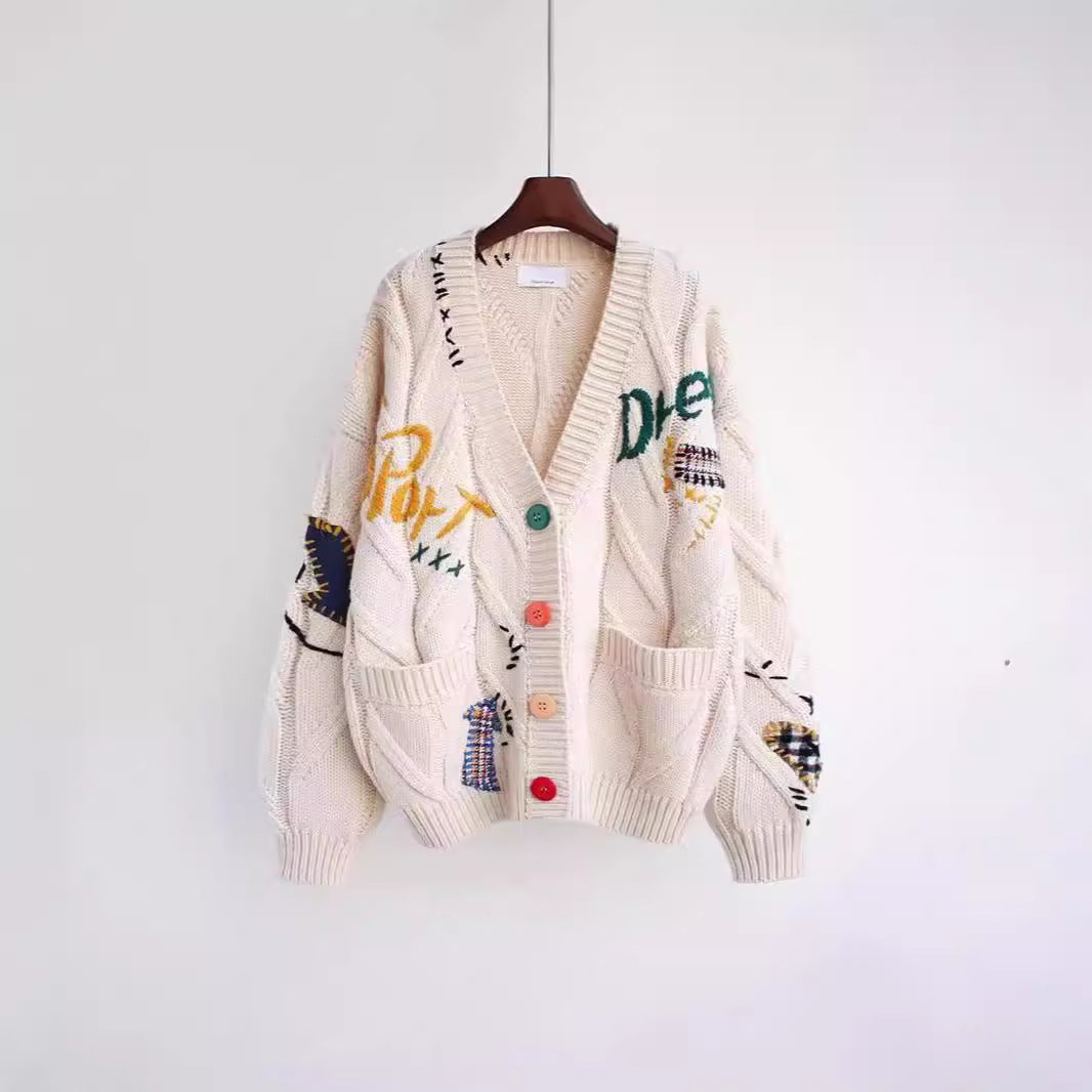 Damen Strickjacke mit buntem Motiv und praktischen Taschen Mirla-Eva Jonsson