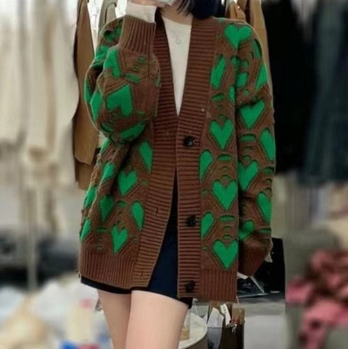 Damen Strickjacke mit einzigartigem Herzmuster und voluminösen Ärmeln Mirla-Eva Jonsson