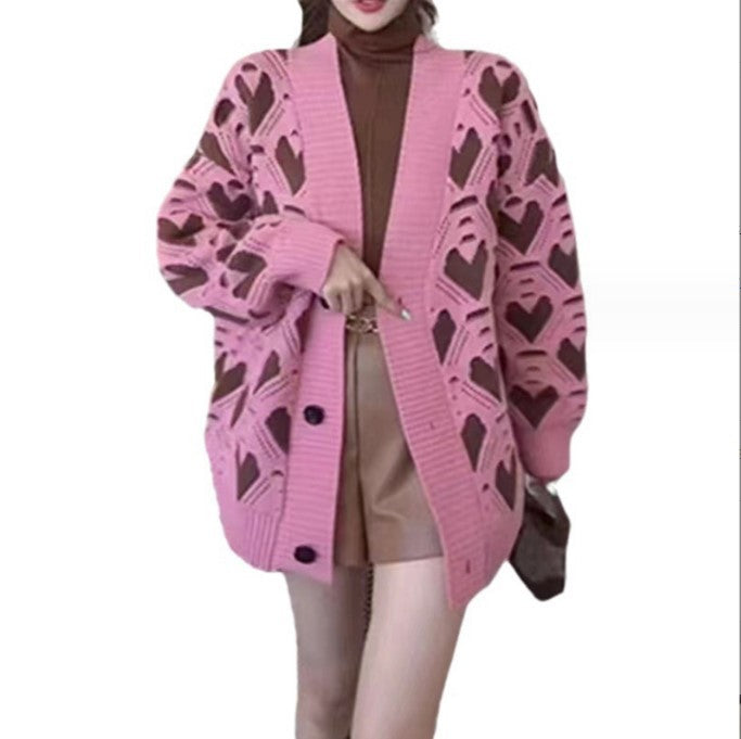 Damen Strickjacke mit einzigartigem Herzmuster und voluminösen Ärmeln Mirla-Eva Jonsson