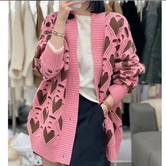 Damen Strickjacke mit einzigartigem Herzmuster und voluminösen Ärmeln Mirla-Eva Jonsson